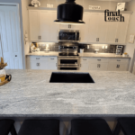Ggranite kuppan white kitchen design