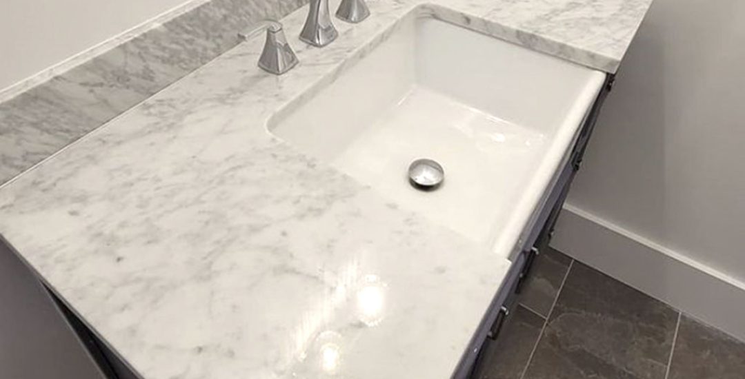 Marble-Carrara-3cm-and-navy-cabinets-4-1024x1024